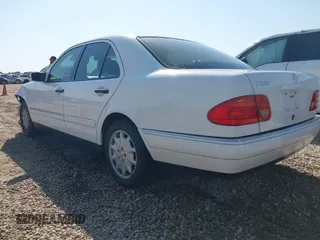 1999 Mercedes-Benz E-Class with VIN WDBJF65H6XA867166, listed as a IAAI auction lot 42017341 with 89,841 mi miles. Bid and sale history available at carsss.com. Image 3.