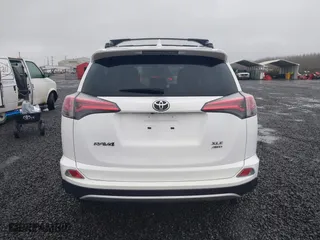 2017 Toyota RAV4 XLE with VIN JTMRFREV2HD212188, listed as a IAAI auction lot 41216790 with 79,594 mi miles. Bid and sale history available at carsss.com. Image 17.