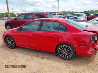 2016 Volkswagen Jetta Sport z VIN 3VWD17AJXGM397980, wystawiony jako IAAI lot #42223826 z przebiegiem 85 915 mil mil oraz . Historia ofert i sprzedaży dostępna na DreamBid. Obrazek 14.