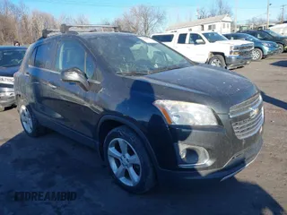 2015 Chevrolet Trax LTZ with VIN KL7CJTSB0FB151750, listed as a IAAI auction lot 41408991 with 147,349 mi miles. Bid and sale history available at carsss.com. Image 1.