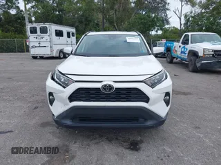 2019 Toyota RAV4 XLE with VIN 2T3W1RFV3KW054552, listed as a IAAI auction lot 40885219 with 40,695 mi miles and . Bid and sale history available at DreamBid. Image 12.
