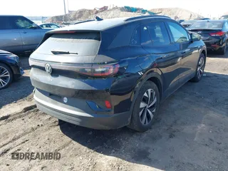 2023 Volkswagen ID.4 Pro with VIN 1V2CMPE8XPC018893, listed as a IAAI auction lot 41694083 with 31,875 mi miles and . Bid and sale history available at DreamBid. Image 4.