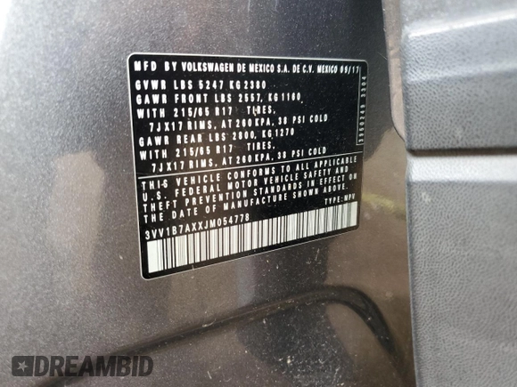 2018 Volkswagen Tiguan S with VIN 3VV1B7AXXJM054778, listed as a Copart auction lot 61294795 with 87,330 mi miles and Salvage title. Bid and sale history available at DreamBid. Image 12.