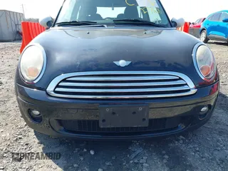2007 MINI Hardtop with VIN WMWMF33567TT53664, listed as a IAAI auction lot 42027768 with 75,970 mi miles and . Bid and sale history available at DreamBid. Image 6.
