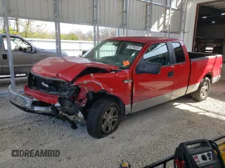 2007 Ford F-150 XL with VIN 1FTPX12V37NA55550, listed as a Copart auction lot 52700325 with 219,721 mi miles and Salvage title. Bid and sale history available at DreamBid. Image 1.