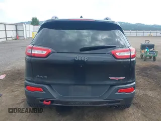 2016 Jeep Cherokee Trailhawk with VIN 1C4PJMBS4GW169267, listed as a IAAI auction lot 42597291 with 79,258 mi miles and . Bid and sale history available at DreamBid. Image 16.