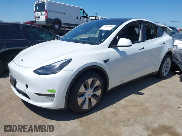 2023 Tesla Model Y Long Range with VIN 7SAYGDEE1PF660444, listed as a IAAI auction lot 42065046 with 23,601 mi miles and . Bid and sale history available at DreamBid. Image 22.