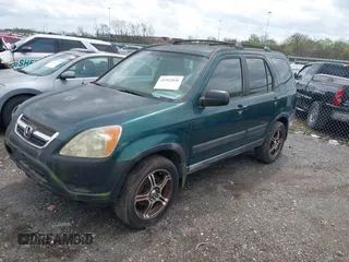 2002 Honda CR-V LX with VIN JHLRD68482C009541, listed as a IAAI auction lot 41952036 with 272,013 mi miles and . Bid and sale history available at carsss.com. Image 2.