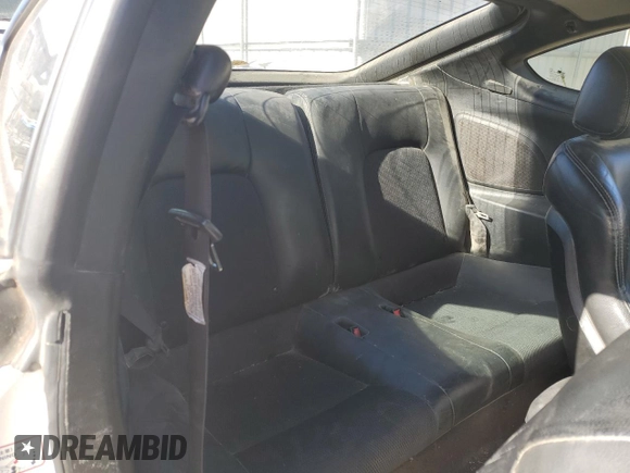 2008 Hyundai Tiburon GT z VIN KMHHN66F98U286353, wystawiony jako Copart lot #88682555 z przebiegiem 174 136 mil mil oraz Szkoda całkowita • Salvage title. Historia ofert i sprzedaży dostępna na DreamBid. Obrazek 11.