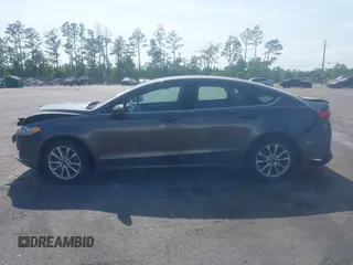 2017 Ford Fusion SE z VIN 3FA6P0H76HR259097, wystawiony jako IAAI lot #42133090 z przebiegiem 187 400 mil mil oraz . Historia ofert i sprzedaży dostępna na DreamBid. Obrazek 14.