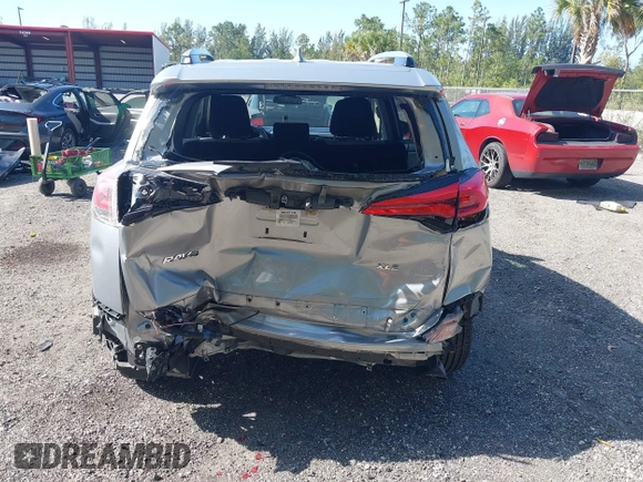 2018 Toyota RAV4 XLE with VIN JTMWFREV9JJ203353, listed as a IAAI auction lot 42129995 with 41,806 mi miles and . Bid and sale history available at DreamBid. Image 6.