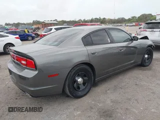2012 Dodge Charger Police with VIN 2C3CDXAT9CH248013, listed as a IAAI auction lot 41728966 with 158,933 mi miles. Bid and sale history available at carsss.com. Image 4.