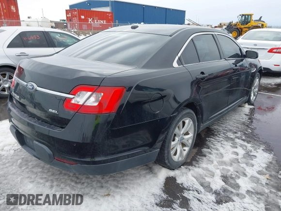 2011 Ford Taurus SEL with VIN 1FAHP2EW1BG114726, listed as a IAAI auction lot 41689674 with 312,338 mi miles. Bid and sale history available at carsss.com. Image 4.