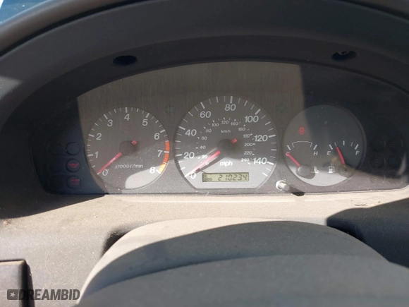 2000 Mazda 626 LX with VIN 1YVGF22CXY5123930, listed as a IAAI auction lot 40712369 with 210,234 mi miles. Bid and sale history available at carsss.com. Image 7.
