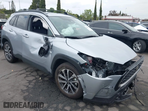 2023 Toyota Corolla Cross XLE with VIN 7MUEAABG8PV077117, listed as a IAAI auction lot 42052305 with 21,571 mi miles and . Bid and sale history available at DreamBid. Image 1.