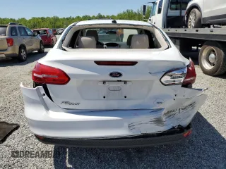2018 Ford Focus SE z VIN 1FADP3F29JL295712, wystawiony jako Copart lot #53361485 z przebiegiem 55 857 mil mil oraz Szkody całkowita. Historia ofert i sprzedaży dostępna na DreamBid. Obrazek 6.