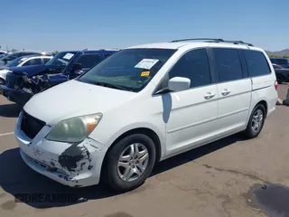 2005 Honda Odyssey EX with VIN 5FNRL38465B081716, listed as a IAAI auction lot 41998956 with 173,182 mi miles and . Bid and sale history available at carsss.com. Image 2.