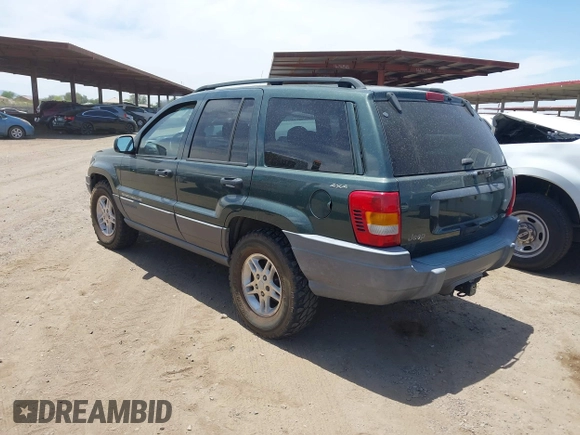 2001 Jeep Grand Cherokee Laredo with VIN 1J4GW48N51C612600, listed as a IAAI auction lot 42348631 with 165,918 mi miles and . Bid and sale history available at DreamBid. Image 3.