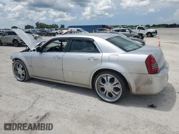 2006 Chrysler 300 C with VIN 2C3LA63H86H319542, listed as a Copart auction lot 63530194 with 167,288 mi miles and Salvage Title. Bid and sale history available at carsss.com. Image 2.