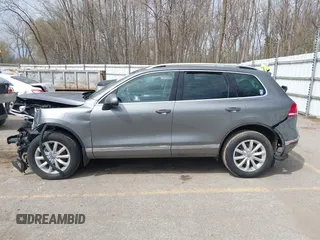 2016 Volkswagen Touareg Sport with VIN WVGEF9BPXGD012206, listed as a IAAI auction lot 42115314 with Not Provided miles and . Bid and sale history available at DreamBid. Image 14.