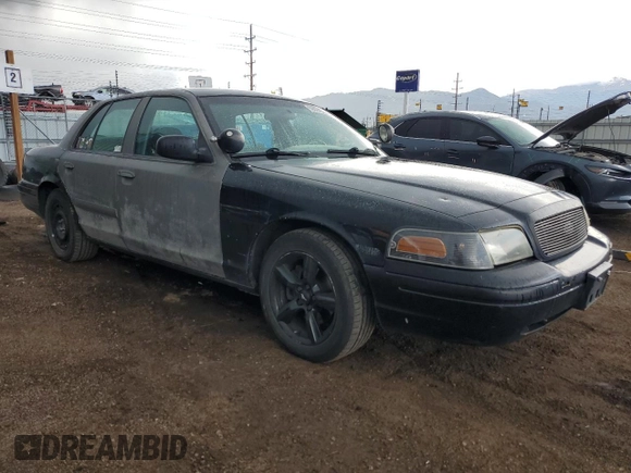2004 Ford Police Interceptor with VIN 2FAHP71W14X138220, listed as a Copart auction lot 59930385 with 169,302 mi miles and Salvage title. Bid and sale history available at DreamBid. Image 4.