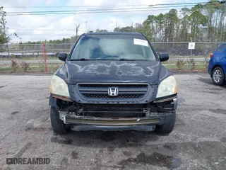2004 Honda Pilot EX with VIN 5FNYF18514B001334, listed as a IAAI auction lot 41754663 with 208,514 mi miles. Bid and sale history available at carsss.com. Image 12.