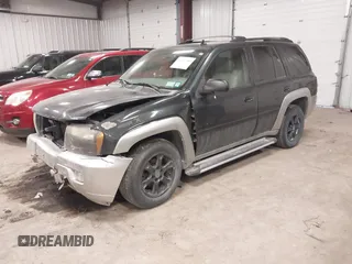 2006 Chevrolet TrailBlazer LS with VIN 1GNDT13SX62107279, listed as a IAAI auction lot 41707289 with 113,665 mi miles and . Bid and sale history available at DreamBid. Image 2.