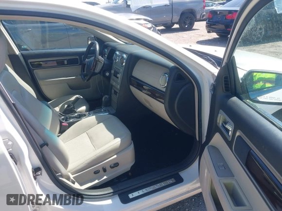 2009 Lincoln MKZ with VIN 3LNHM26T59R610490, listed as a IAAI auction lot 42029239 with 39,539 mi miles and . Bid and sale history available at DreamBid. Image 5.