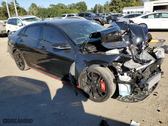 2024 Hyundai Elantra N with VIN KMHLW4DK3RU020856, listed as a Copart auction lot 76778994 with 2,611 mi miles and Salvage Title. Bid and sale history available at carsss.com. Image 4.