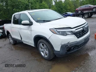 2020 Honda Ridgeline RTL with VIN 5FPYK3F52LB030440, listed as a IAAI auction lot 42321758 with 14,680 mi miles and . Bid and sale history available at DreamBid. Image 1.