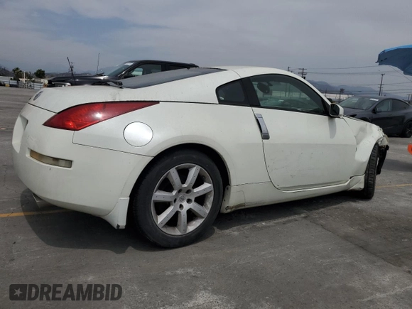 2004 Nissan 350Z Touring with VIN JN1AZ34D74T160909, listed as a Copart auction lot 58302075 with 54,100 mi miles and Salvage title. Bid and sale history available at DreamBid. Image 3.