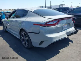 2018 Kia Stinger GT1 with VIN KNAE45LC7J6034168, listed as a IAAI auction lot 41979658 with 111,854 mi miles. Bid and sale history available at carsss.com. Image 3.