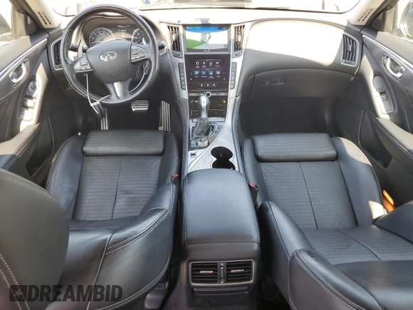 2015 Infiniti Q50 Premium with VIN JN1BV7AR6FM415389, listed as a Copart auction lot 61653845 with 124,141 mi miles and Salvage title. Bid and sale history available at DreamBid. Image 8.