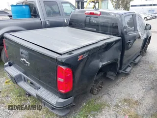 2019 Chevrolet Colorado 4WD Z71 with VIN 1GCGTDEN5K1289956, listed as a IAAI auction lot 41729406 with 60,887 mi miles. Bid and sale history available at carsss.com. Image 4.