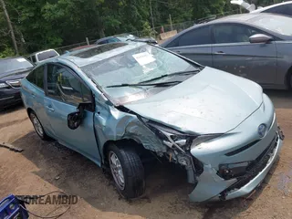 2017 Toyota Prius Two with VIN JTDKARFU3H3033072, listed as a IAAI auction lot 42425423 with 113,036 mi miles and . Bid and sale history available at DreamBid. Image 1.