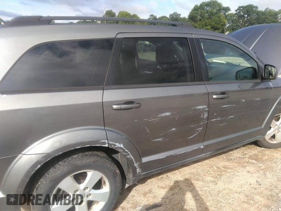 2012 Dodge Journey SXT with VIN 3C4PDCBG9CT153241, listed as a IAAI auction lot 42640265 with 184,719 mi miles and . Bid and sale history available at DreamBid. Image 6.
