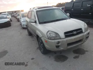 2007 Hyundai Tucson SE with VIN KM8JN12D77U539841, listed as a IAAI auction lot 41777599 with 126,958 mi miles. Bid and sale history available at carsss.com. Image 1.