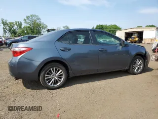 2014 Toyota Corolla L z VIN 2T1BURHE8EC190080, wystawiony jako Copart lot #60614225 z przebiegiem 194 254 mil mil oraz Szkoda całkowita • Salvage title. Historia ofert i sprzedaży dostępna na DreamBid. Obrazek 3.
