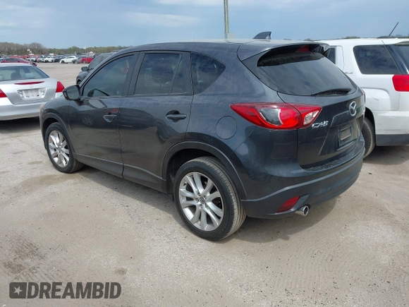 2014 Mazda CX-5 Grand Touring with VIN JM3KE2DY0E0354220, listed as a IAAI auction lot 41885502 with 168,901 mi miles. Bid and sale history available at carsss.com. Image 3.