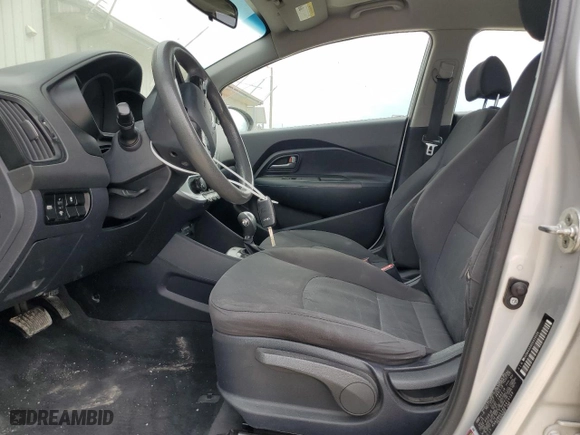 2014 Kia Rio LX with VIN KNADM4A34E6414129, listed as a Copart auction lot 57200814 with 101090 miles and Salvage Title. Bid and sale history available at carsss.com. Image 7.