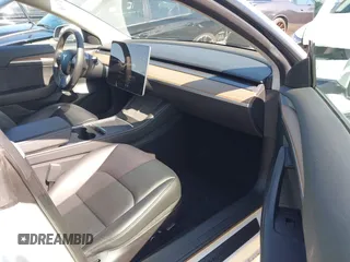 2023 Tesla Model 3 z VIN 5YJ3E1EA5PF401237, wystawiony jako IAAI lot #42520423 z przebiegiem 45 262 mil mil oraz . Historia ofert i sprzedaży dostępna na DreamBid. Obrazek 5.