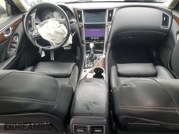 2014 Infiniti Q50 Premium z VIN JN1BV7AR7EM688906, wystawiony jako Copart lot #62562885 z przebiegiem 95 548 mil mil oraz Szkoda całkowita • Salvage title. Historia ofert i sprzedaży dostępna na DreamBid. Obrazek 8.