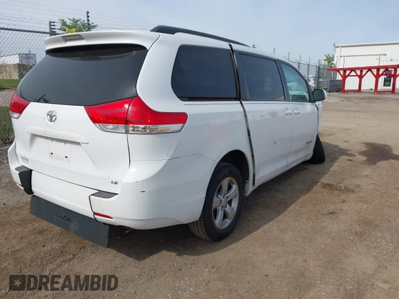 2014 Toyota Sienna LE AAS with VIN 5TDKK3DC0ES439163, listed as a IAAI auction lot 42155274 with Not provided miles and . Bid and sale history available at DreamBid. Image 4.