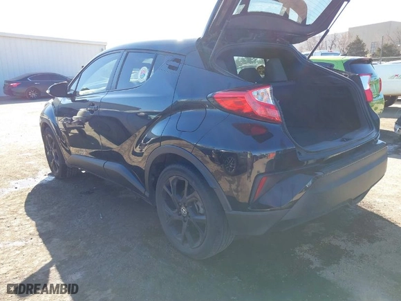 2021 Toyota C-HR LE with VIN JTNKHMBX2M1098138, listed as a IAAI auction lot 41679903 with 49,390 mi miles. Bid and sale history available at carsss.com. Image 3.