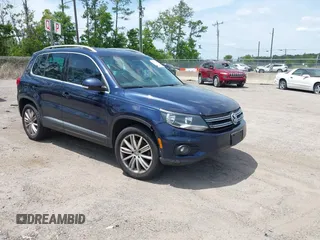 2012 Volkswagen Tiguan SEL with VIN WVGAV7AX7CW608637, listed as a IAAI auction lot 42173987 with 149,013 mi miles and . Bid and sale history available at DreamBid. Image 1.
