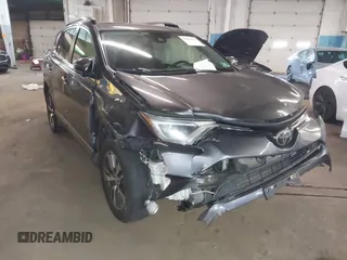 2018 Toyota RAV4 XLE with VIN JTMRFREV8JJ208377, listed as a IAAI auction lot 41629369 with 160,870 mi miles. Bid and sale history available at carsss.com. Image 1.