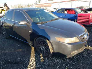 2004 Acura TSX w/Navigation with VIN JH4CL96984C000085, listed as a IAAI auction lot 41412527 with 217,532 mi miles. Bid and sale history available at carsss.com. Image 1.