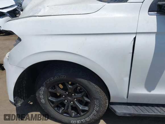 2023 Ford Expedition Timberline with VIN 1FMJU1RGXPEA34504, listed as a IAAI auction lot 42583531 with 18,986 mi miles and . Bid and sale history available at DreamBid. Image 18.
