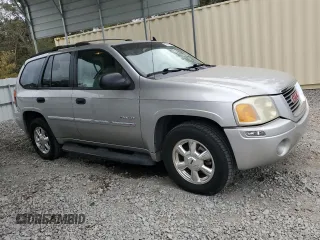 2006 GMC Envoy SLT with VIN 1GKDS13S062186025, listed as a Copart auction lot 79041904 with 220,053 mi miles and Salvage Title. Bid and sale history available at carsss.com. Image 4.