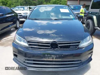 2015 Volkswagen Jetta SE with VIN 3VWD17AJ1FM407228, listed as a IAAI auction lot 42250711 with 189,275 mi miles and . Bid and sale history available at DreamBid. Image 6.
